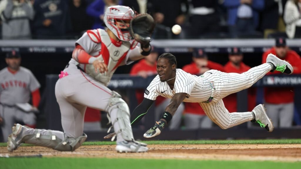 Chisholm turns page after benching, saves Yankees in Game 2