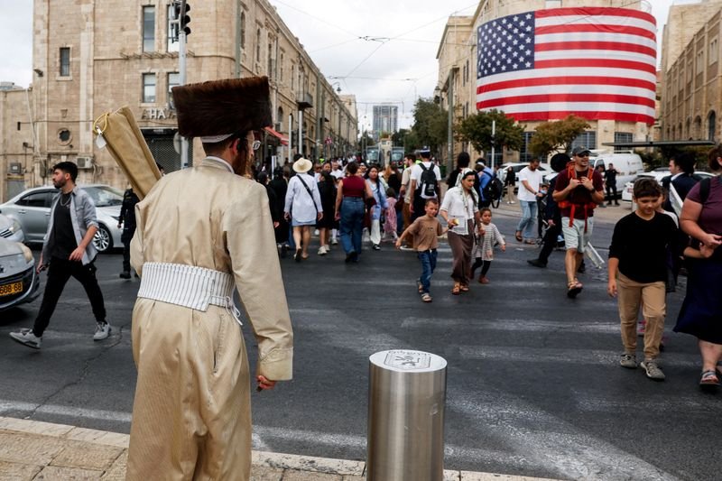 Hamas begins releasing Israeli hostages, as Trump heads to Israel